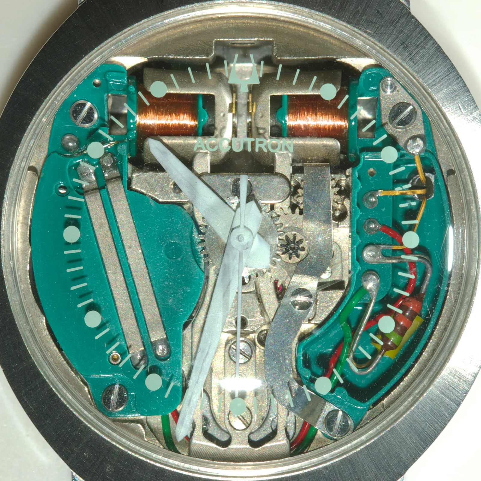Bulova Accutron Spaceview from 1963, an open dial showing the tuning fork, off the wrist on a white ground