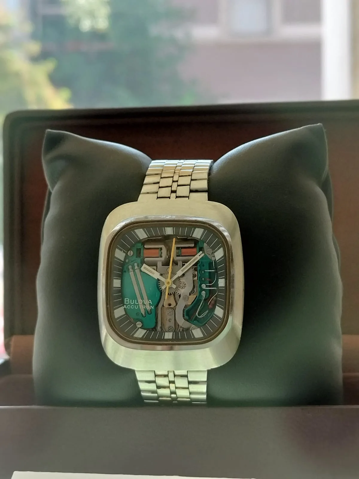 Bulova Accutron Spaceview with calibre 214, open movement as the dial, off the wrist on a white ground