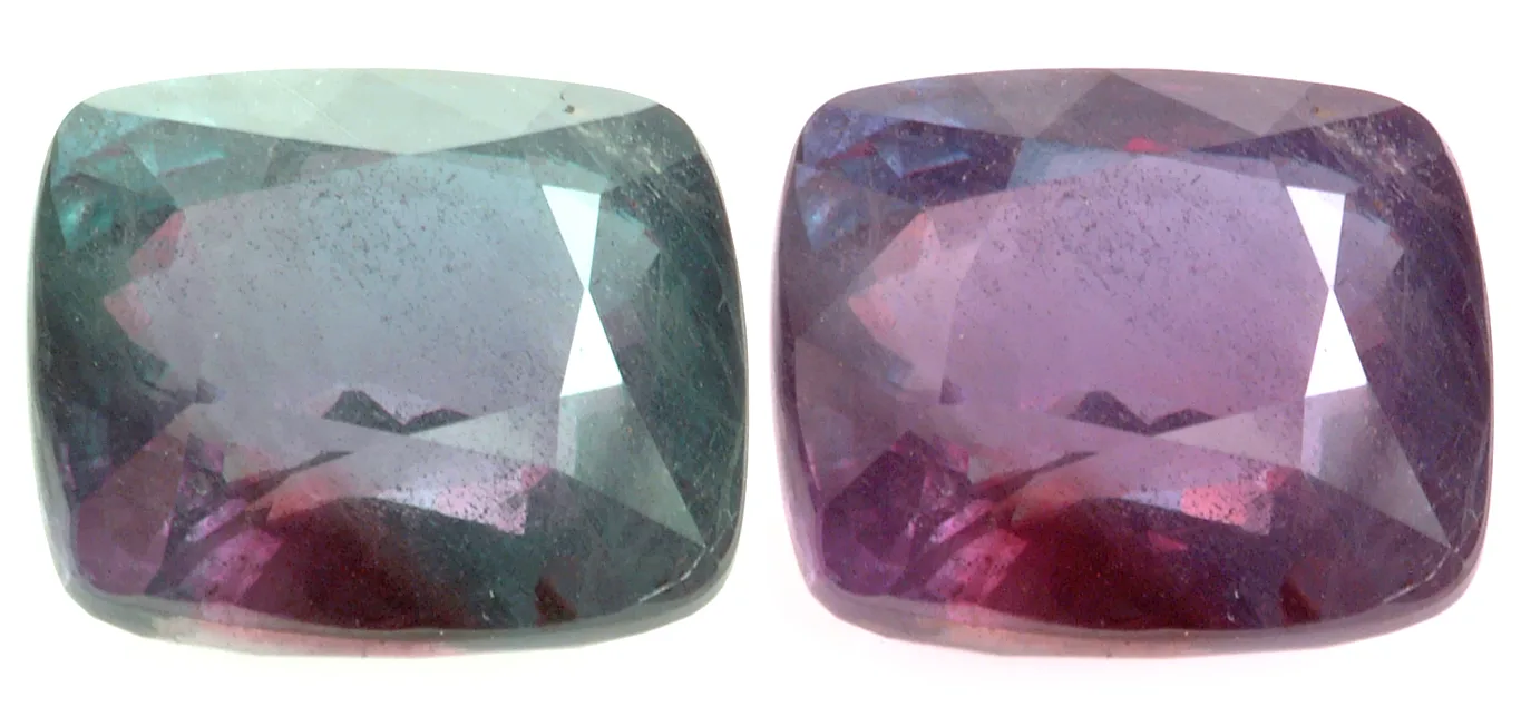 Alexandrite cushion of 26.75 carats shown as one plate, bluish green in daylight beside purple-red under incandescent light