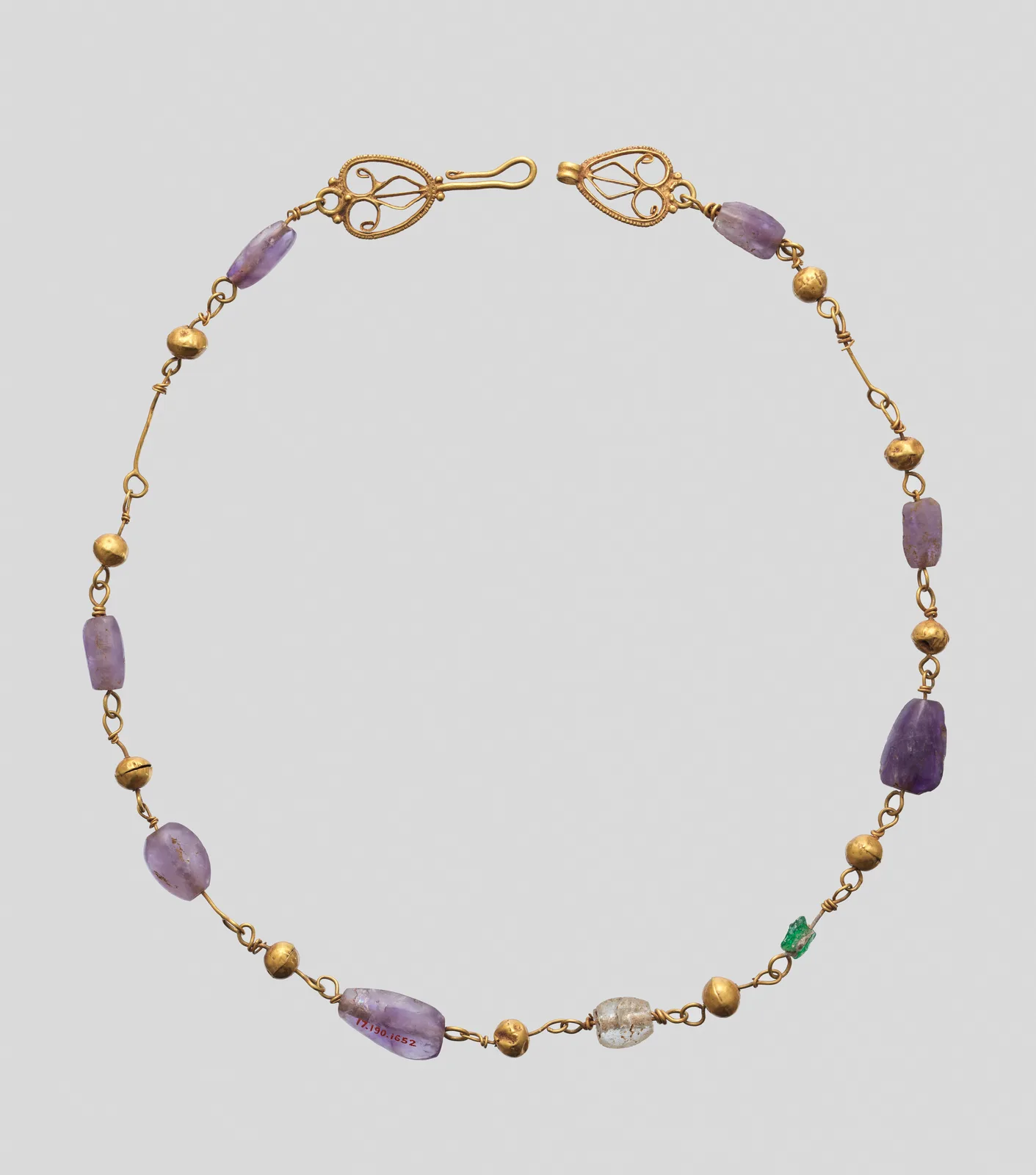 Byzantine gold necklace of oval amethyst beads alternating with gold spheres, ending in openwork gold clasps