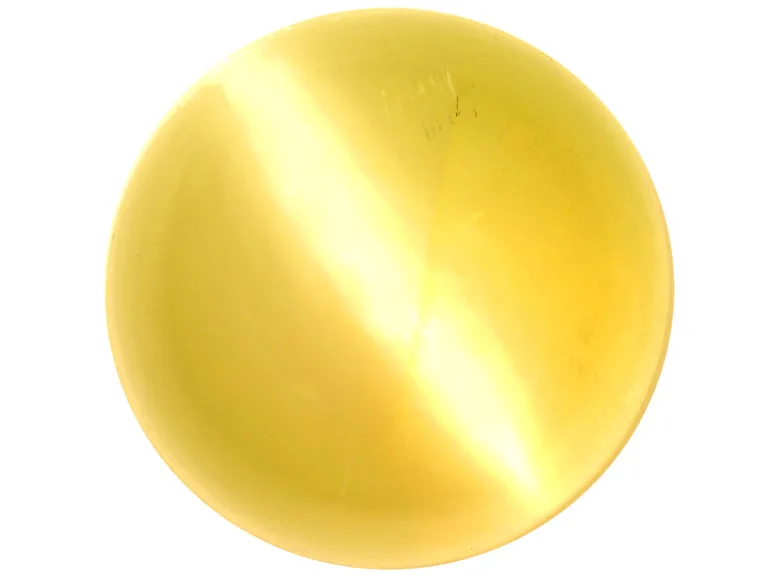 A round honey-and-olive cat’s-eye chrysoberyl cabochon with a sharp bright band down the center