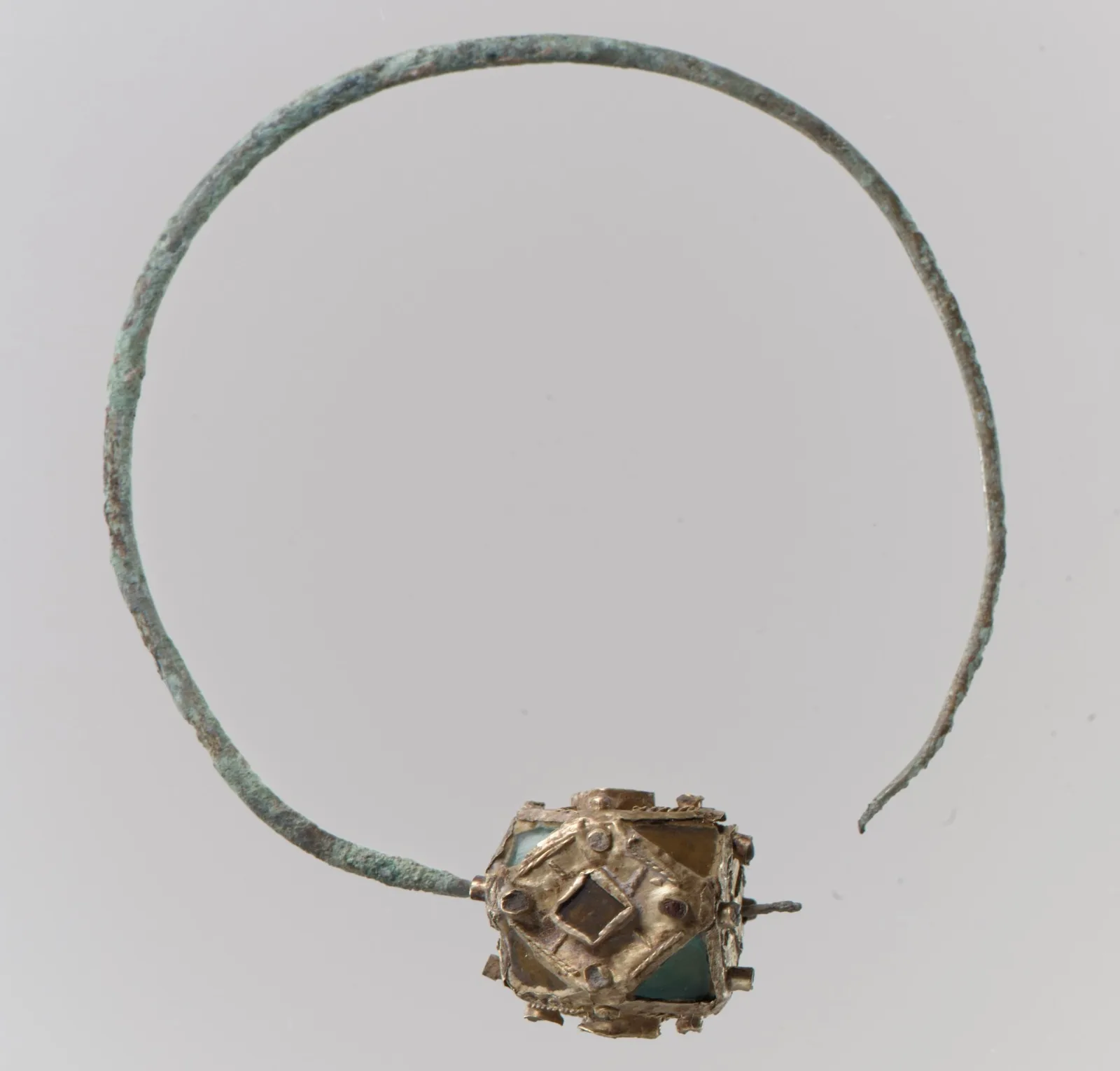 Frankish earring with a silver hoop and a faceted gold bead inlaid with a small apple-green chrysoprase, glass, and pearls