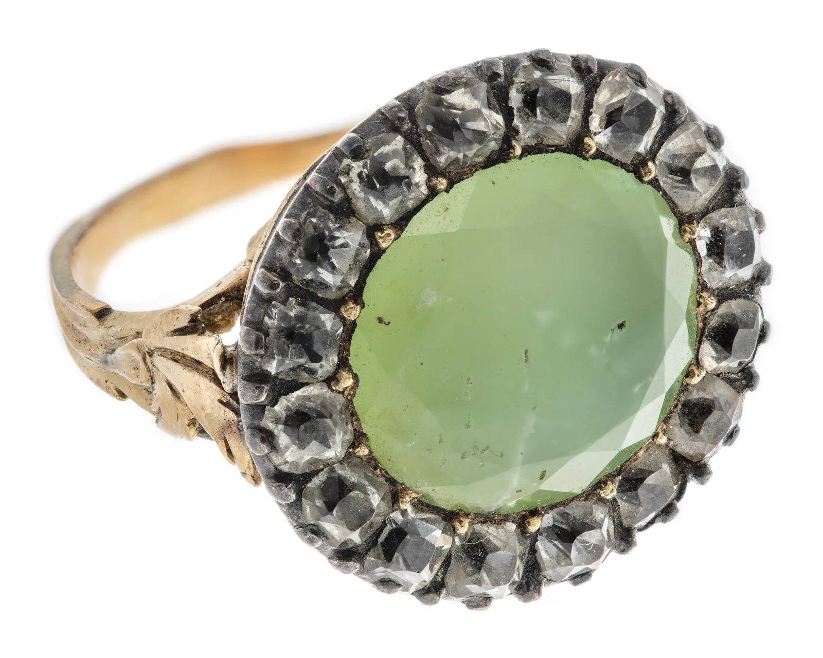 Eighteenth-century gold ring with a pale apple-green chrysoprase at the center of a rosette of brilliant-cut rock crystals