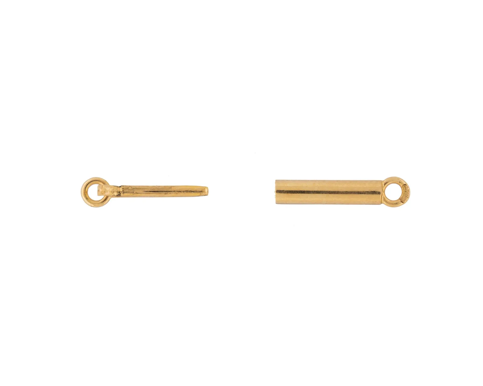 Gold necklace clasp laid open: a pin with a ring at one end, a barrel tube with a ring at the other, the two parts of the join