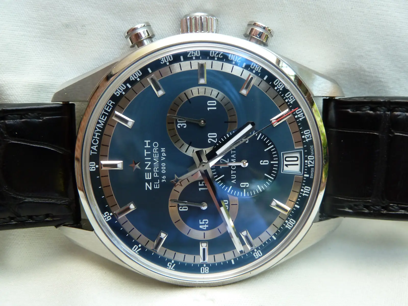 Zenith El Primero Tribute to Charles Vermot with a star at twelve and a date, shown off the wrist on a white ground