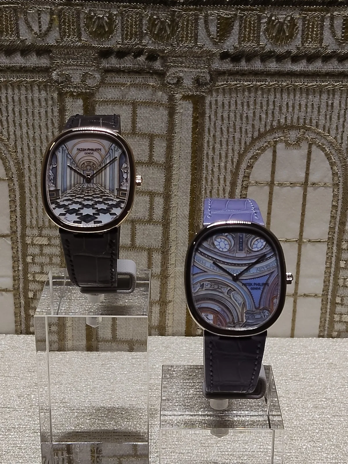 An engraved Patek Philippe Golden Ellipse Rare Handcrafts in gold with a gold bracelet and a blue dial, shown off the wrist