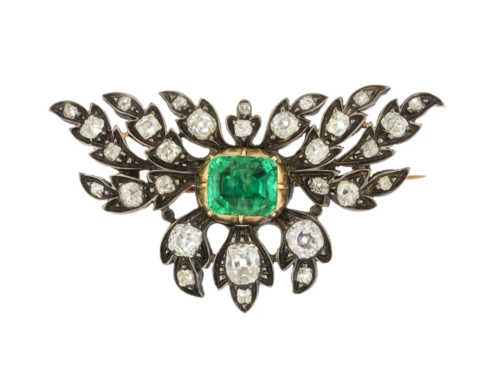 Nineteenth-century diamond spray brooch with a square emerald-cut emerald at the center, corners clipped, leaves of old-cut diamonds around it