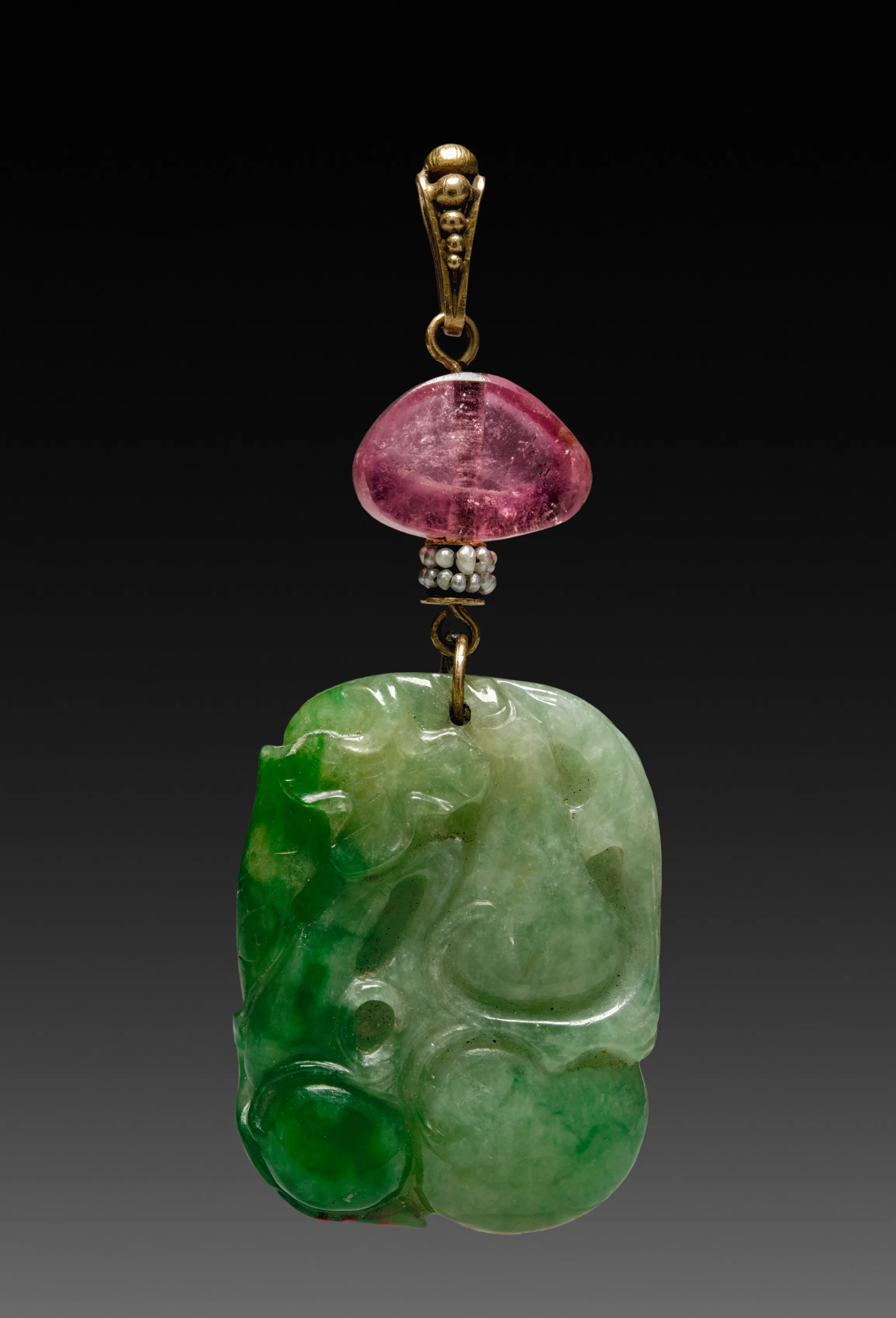 Qing jade pendant, a carved cool-green plaque hung from a pale rose-quartz bead, a ring of seed pearls, and a small gold bail