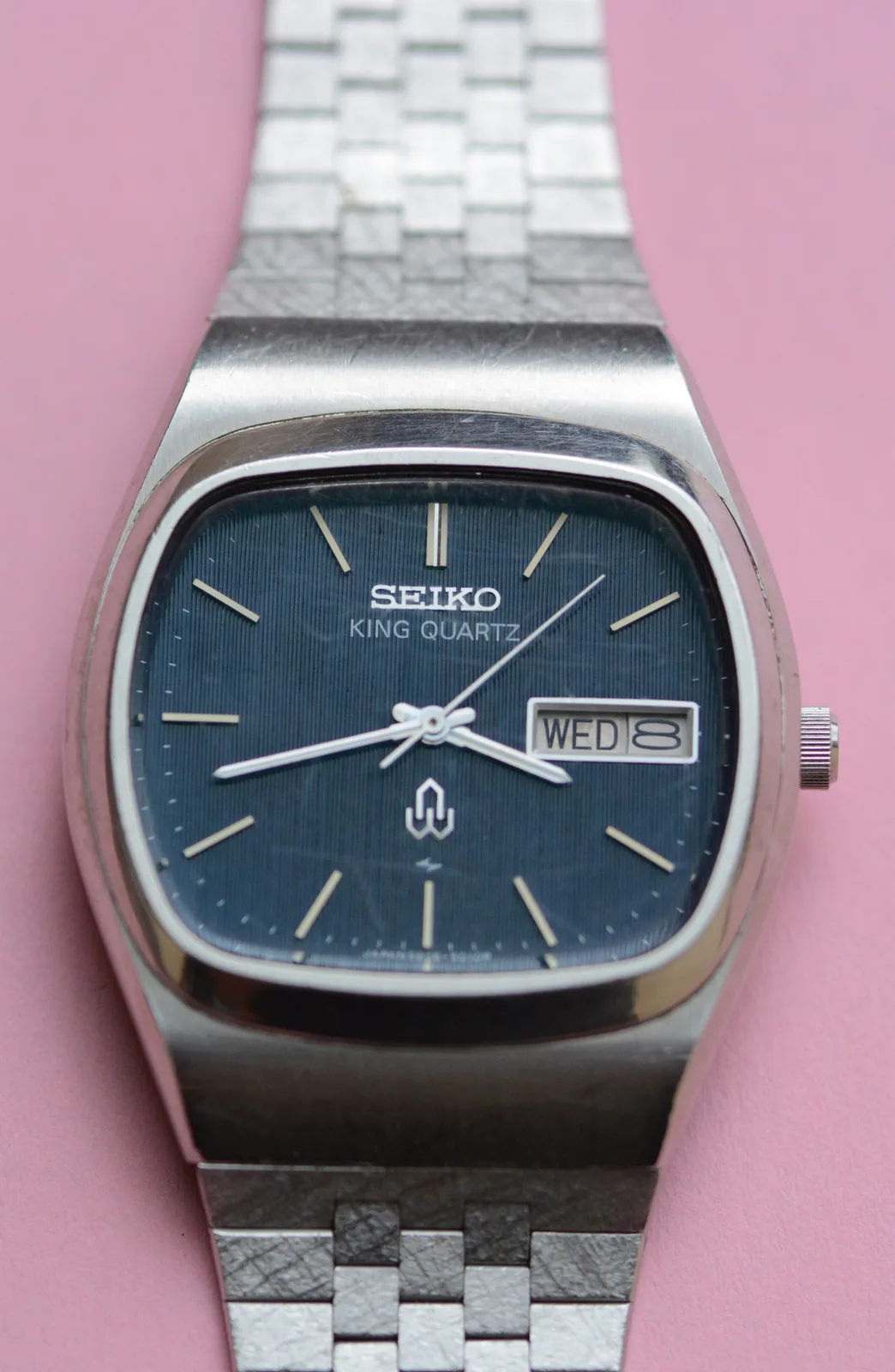 A 1977 King Quartz reference 5856-5010 with a silver dial and a date, shown off the wrist