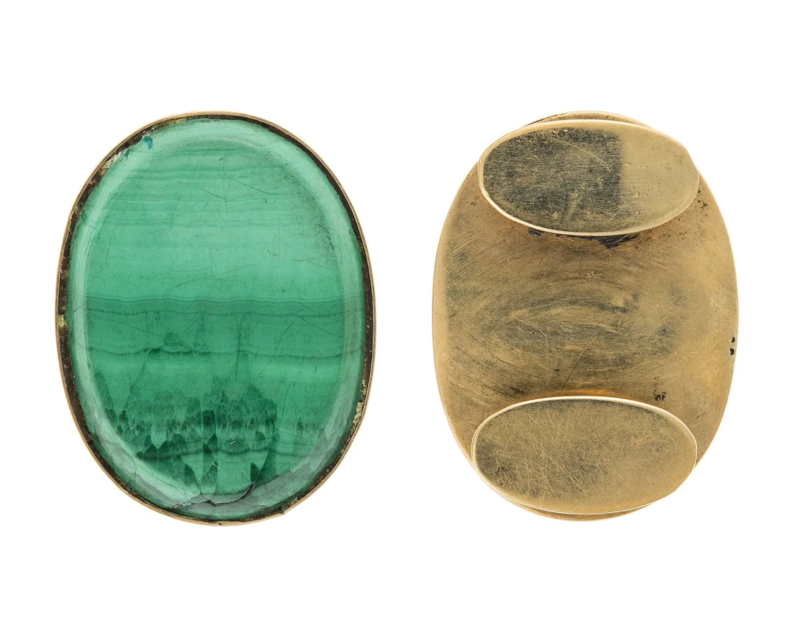 Pair of gold cufflinks, one face an oval of banded malachite, the other a plain gold back