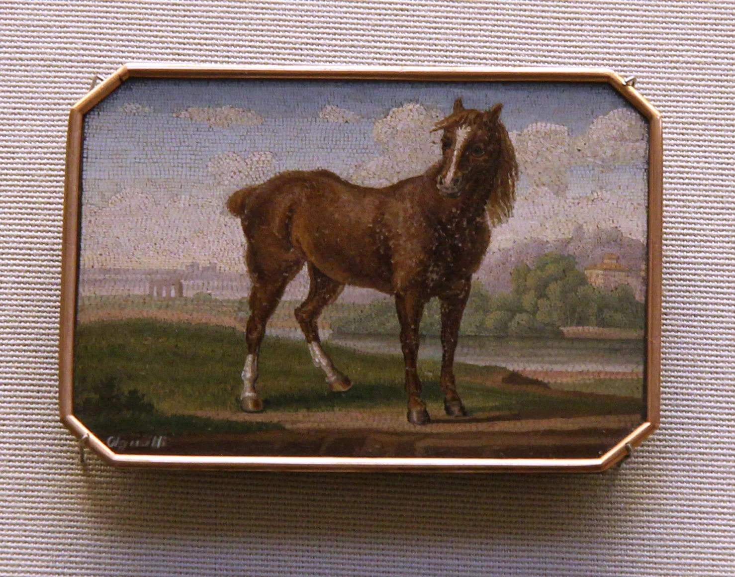 A round micromosaic of a horse in a landscape, signed by Antonio Aguatti, British Museum