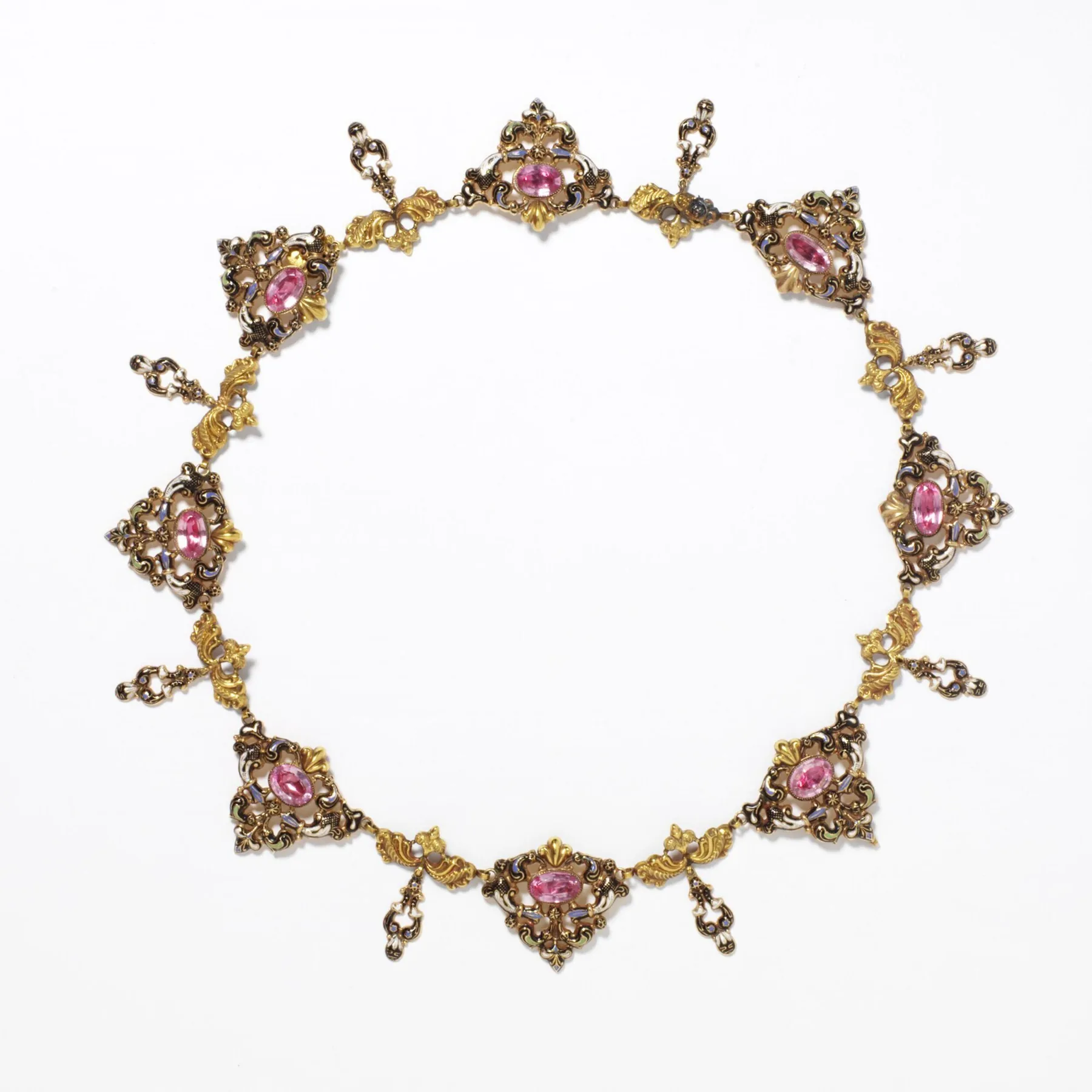 Stamped and enamelled gold necklace set with a row of pink foiled topaz stones as soft rose panes