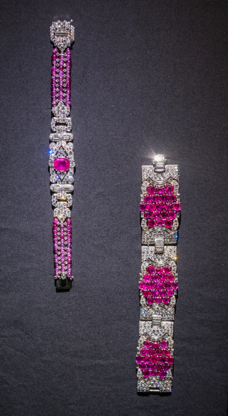 Two Oscar Heyman ruby and diamond bracelets, one with a continuous scalloped ruby field