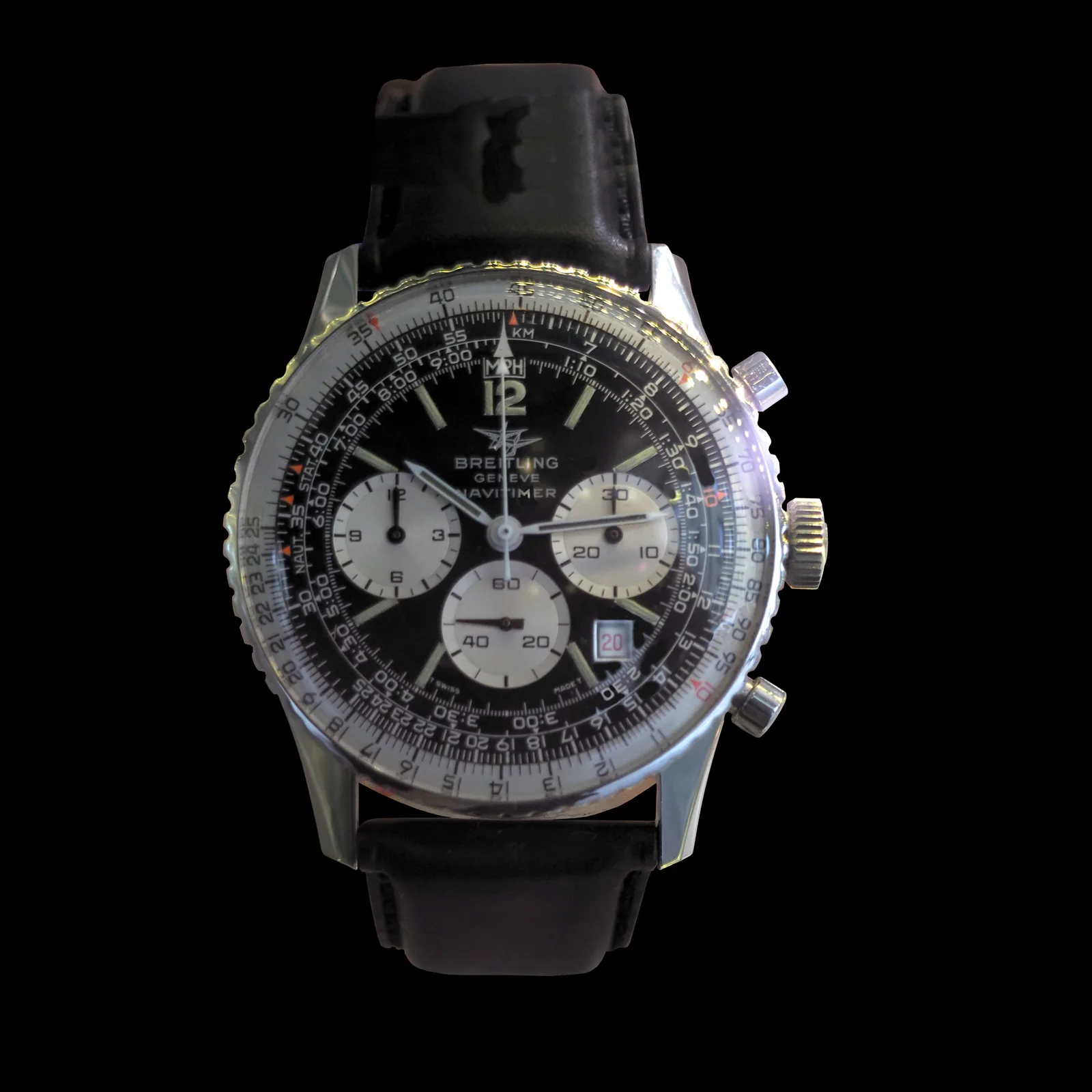 Breitling Navitimer from 1975 with a black dial and a circular slide-rule bezel, shown off the wrist