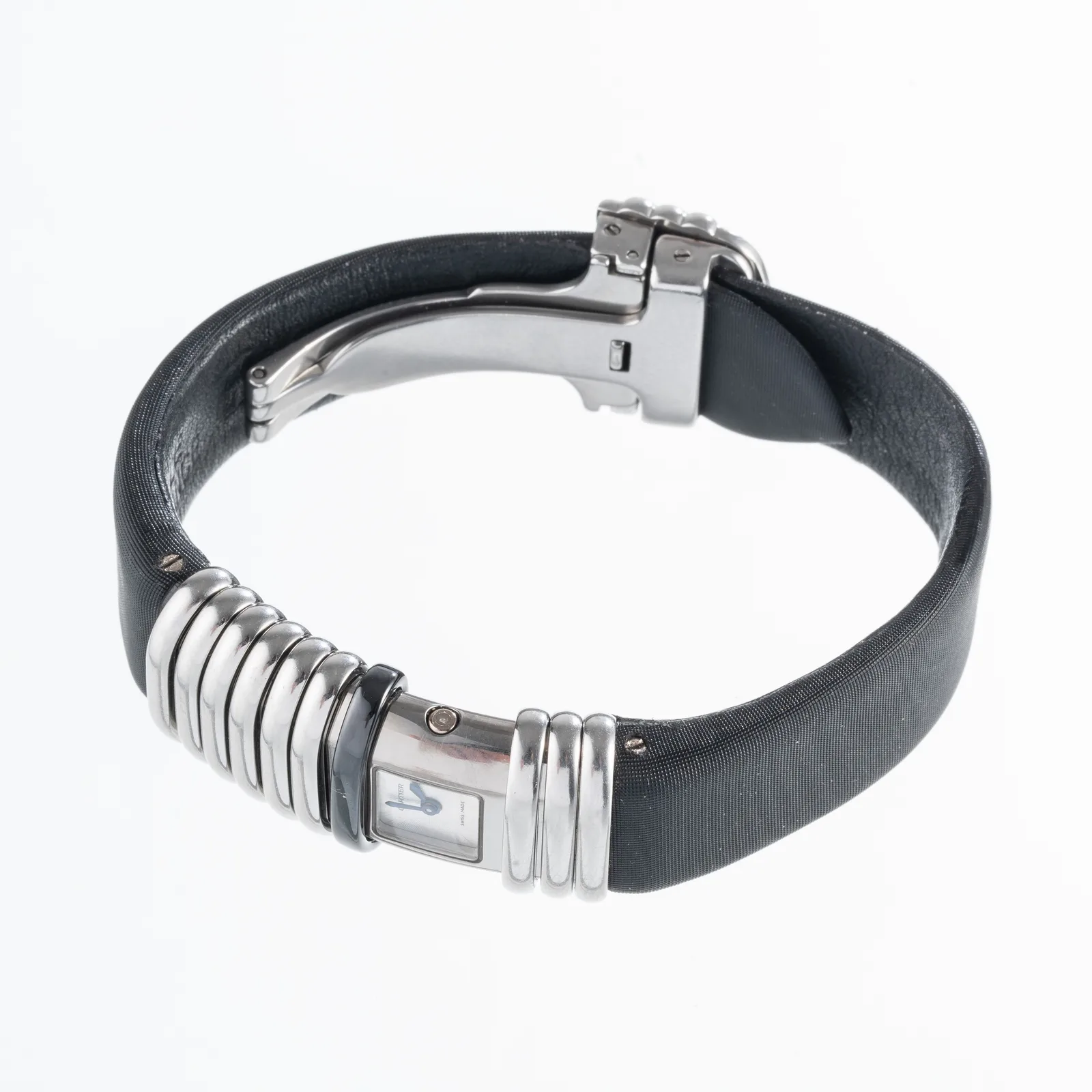 Cartier Déclaration jewelry watch with a small rectangular dial set into a black ribbed bracelet