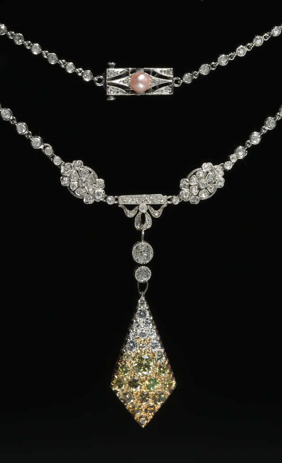 American diamond necklace with a line of collet-set stones, a diamond bow, and a kite-shaped drop