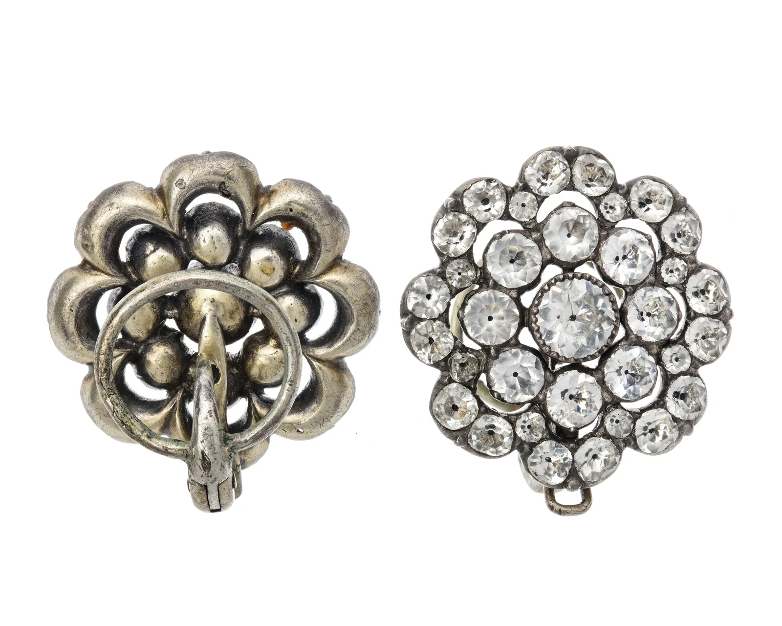 A pair of eighteenth-century earrings in gilt silver, each with a cluster above and faceted rock crystal drops below