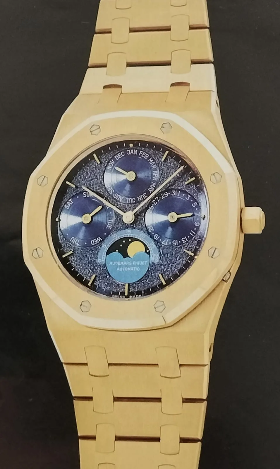 Gold Audemars Piguet Royal Oak with a perpetual calendar, octagonal bezel and integrated bracelet, shown off the wrist