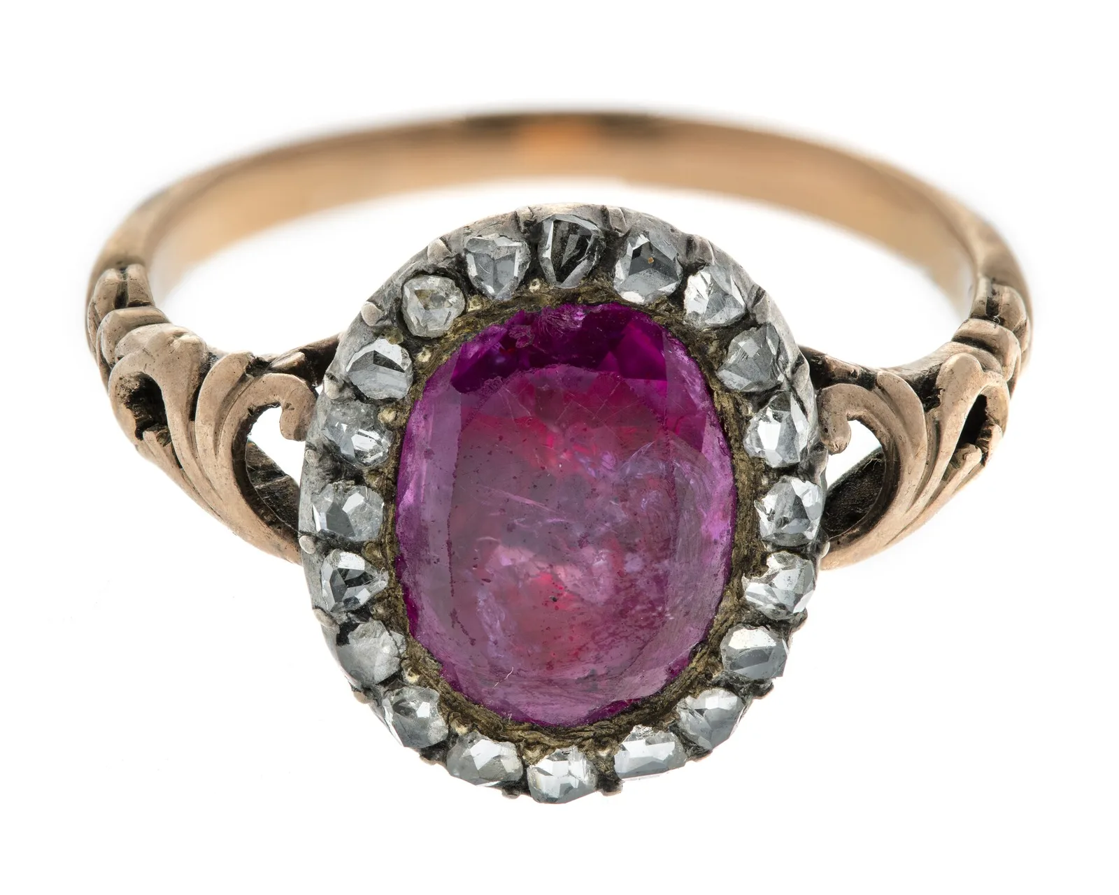 Eighteenth-century gold ring with an oval table-cut ruby surrounded by a halo of rose-cut stones