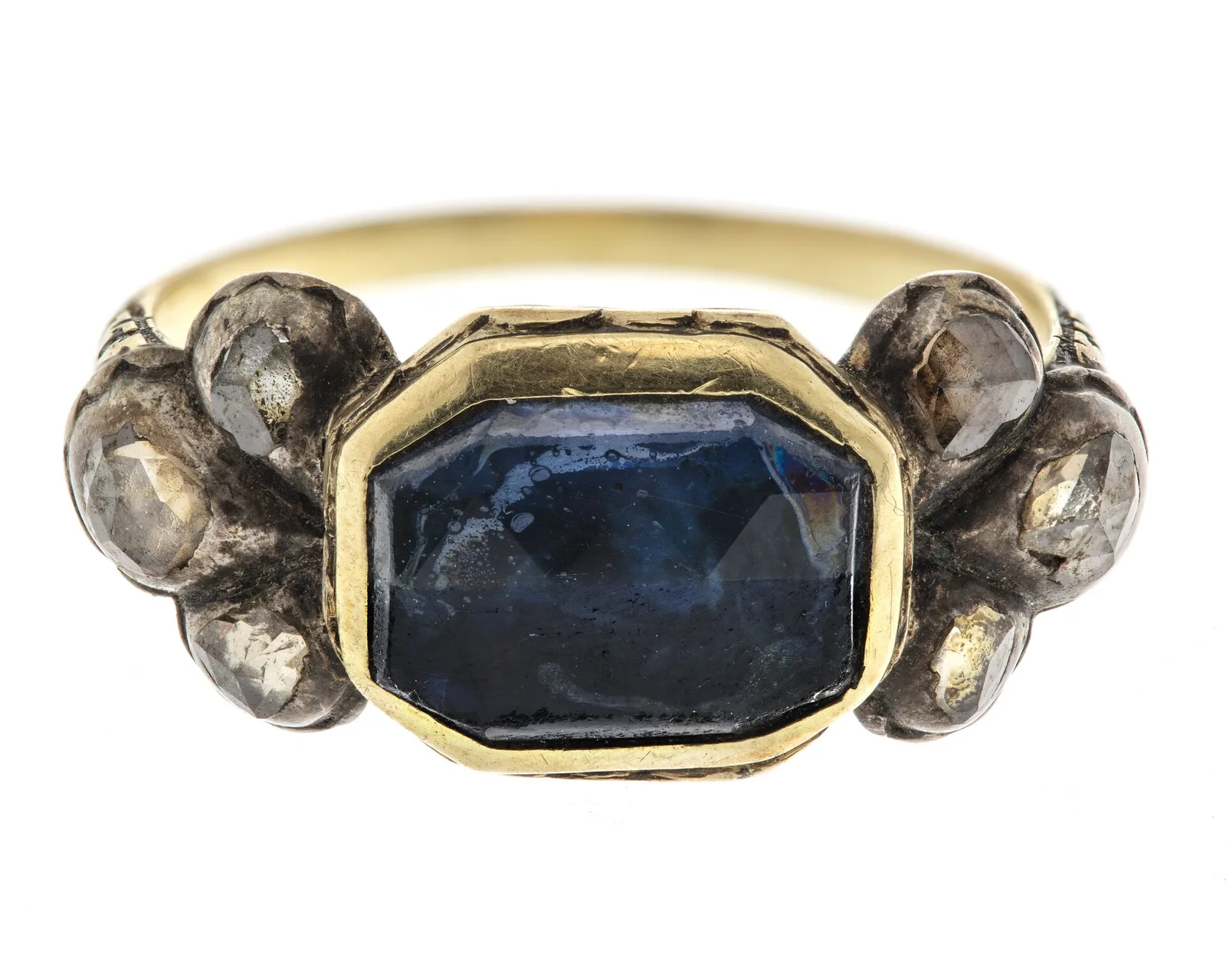 Eighteenth-century gold ring with a rectangular faceted deep-blue sapphire and rose-cut stones at each end