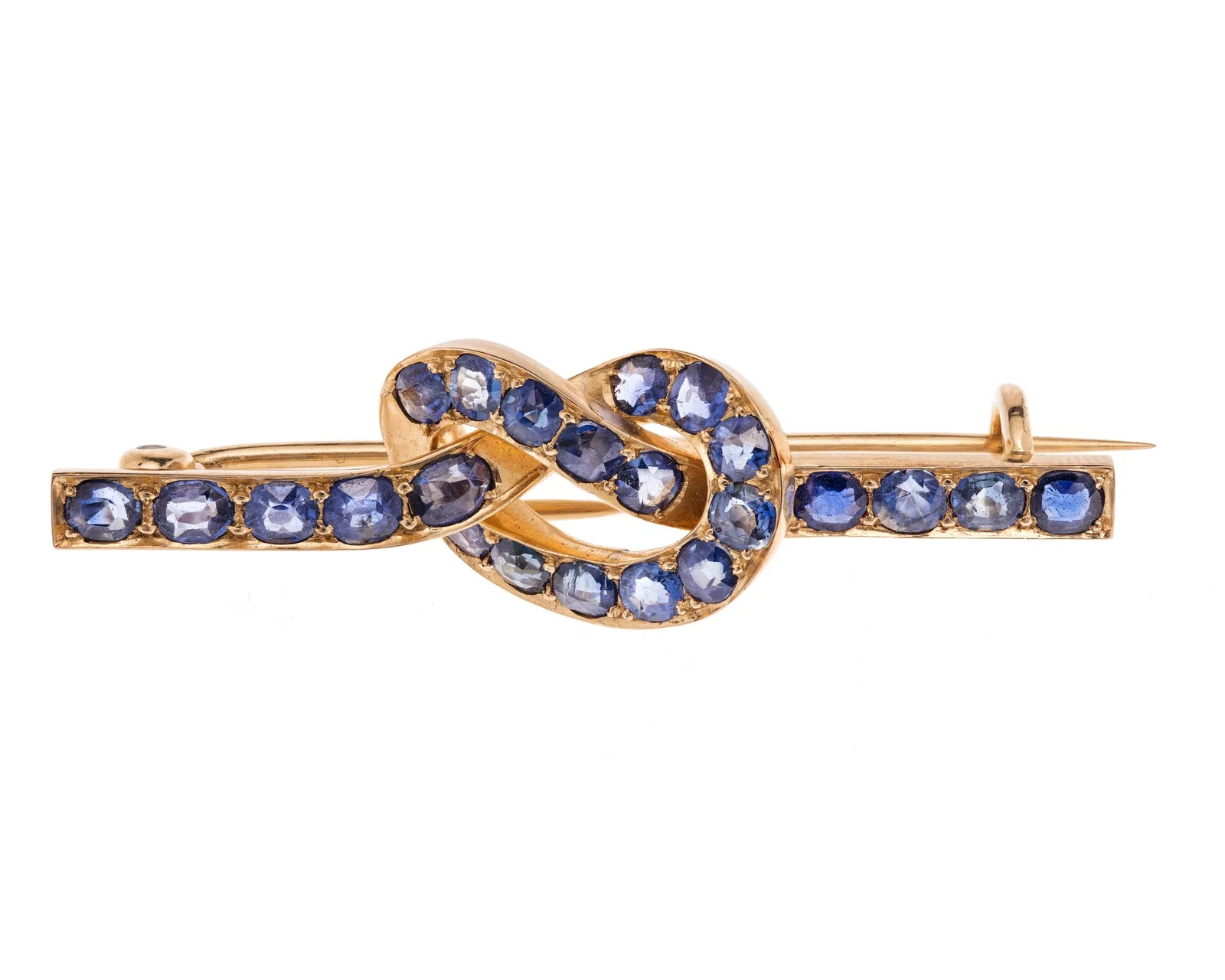 Gold brooch set with many brilliant-cut deep-blue sapphires as a spray of blue on metal