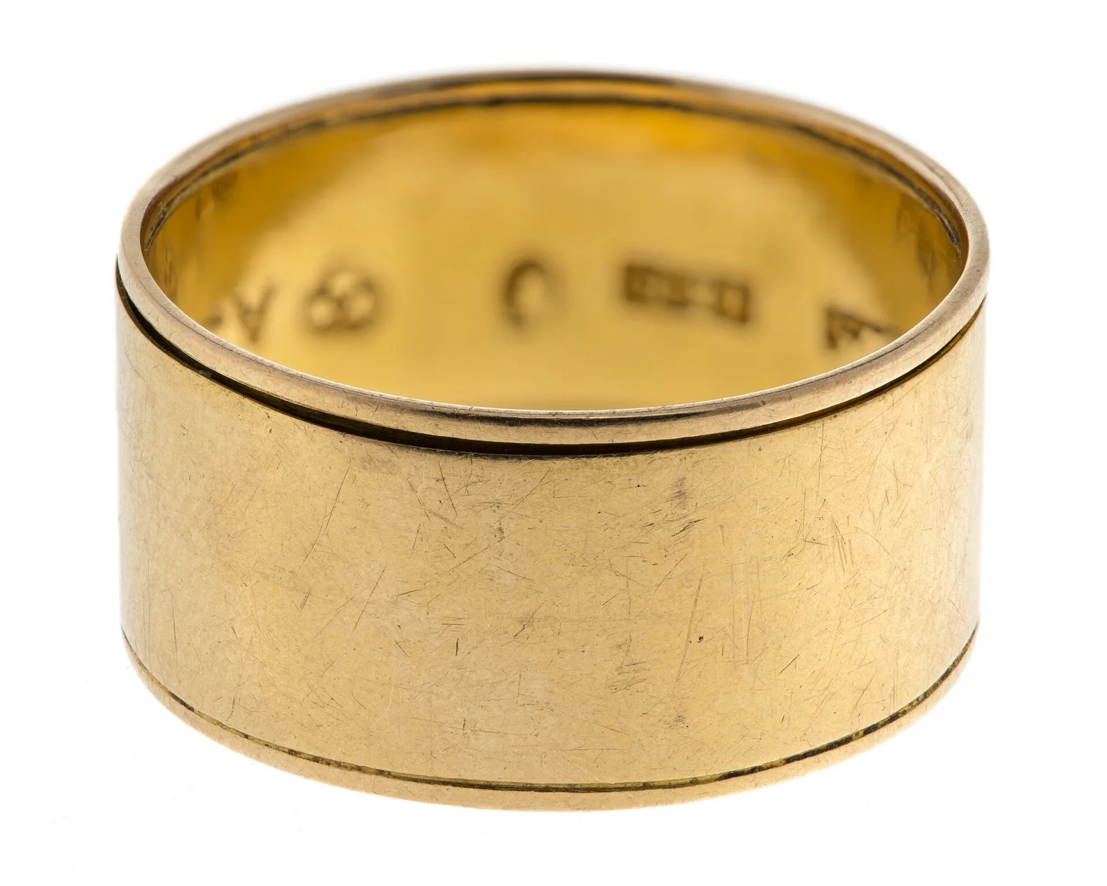 Wide plain gold finger ring of 1807, a smooth band with hallmarks visible inside the hoop