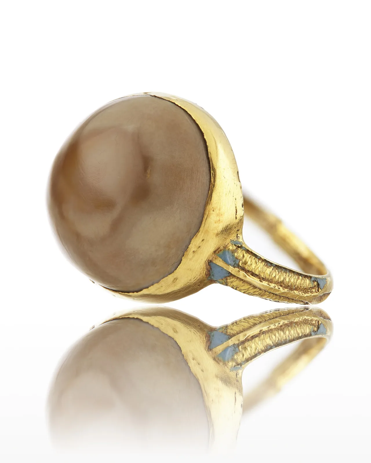 Seventeenth-century gold ring with one domed agate in a high bezel, the hoop plain beside it