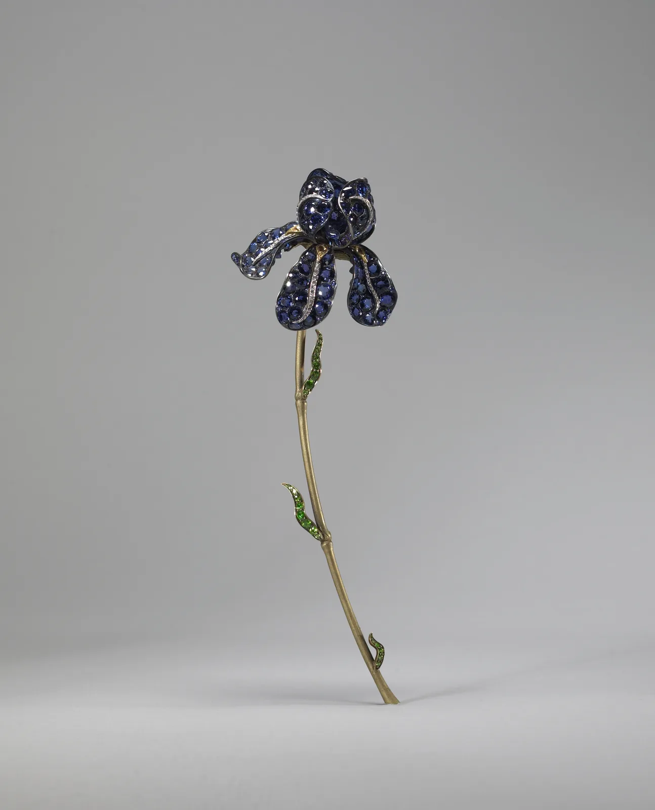 Tiffany iris corsage ornament in sapphires and diamonds on a gold stem