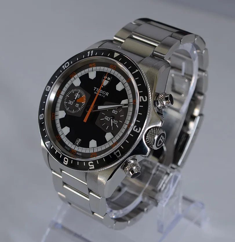 Tudor Heritage Chronograph with a light dial, dark registers, and a shield at twelve, shown off the wrist