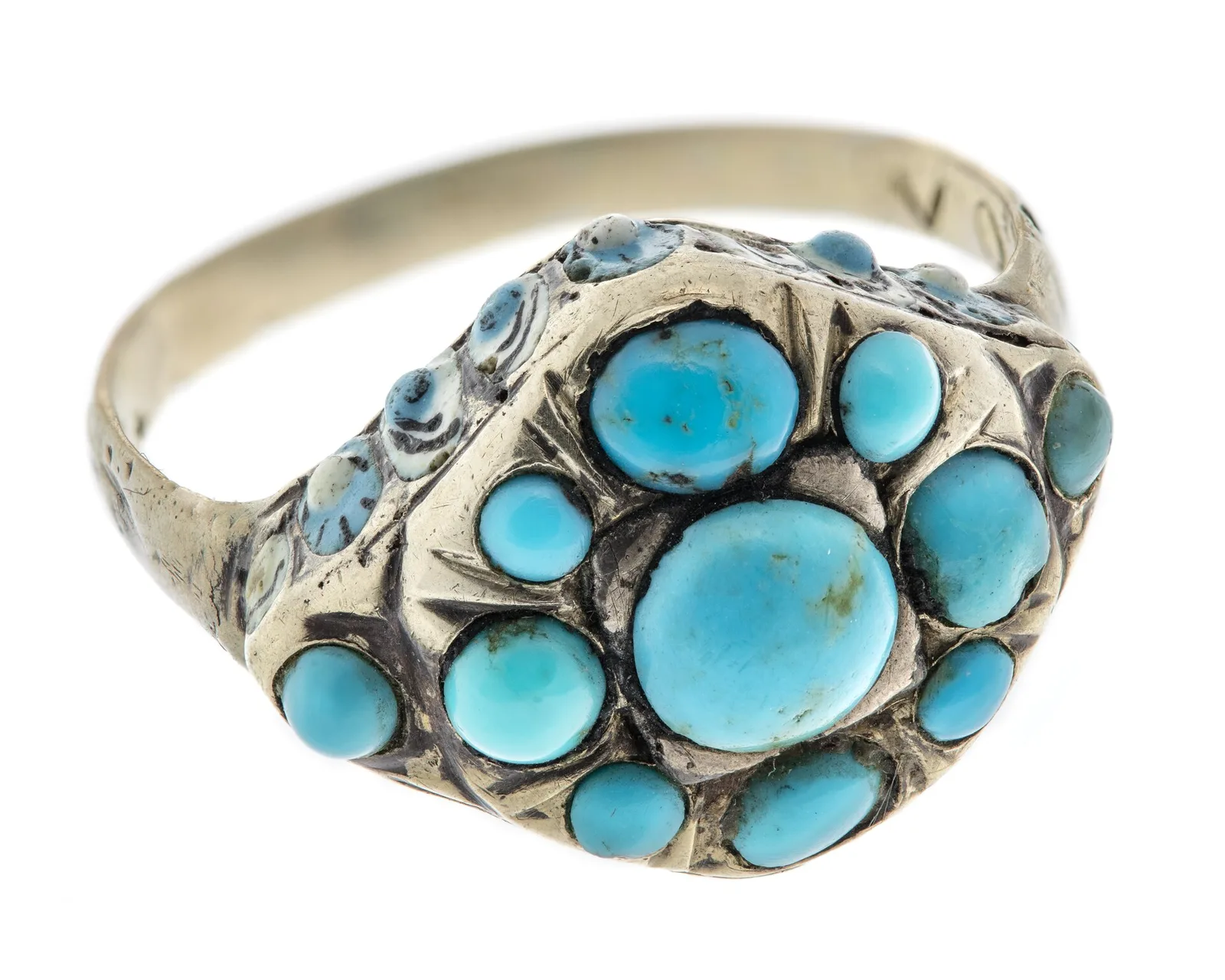 Eighteenth-century gold ring with a cluster of round sky-blue turquoise cabochons, a larger center stone ringed by smaller panes