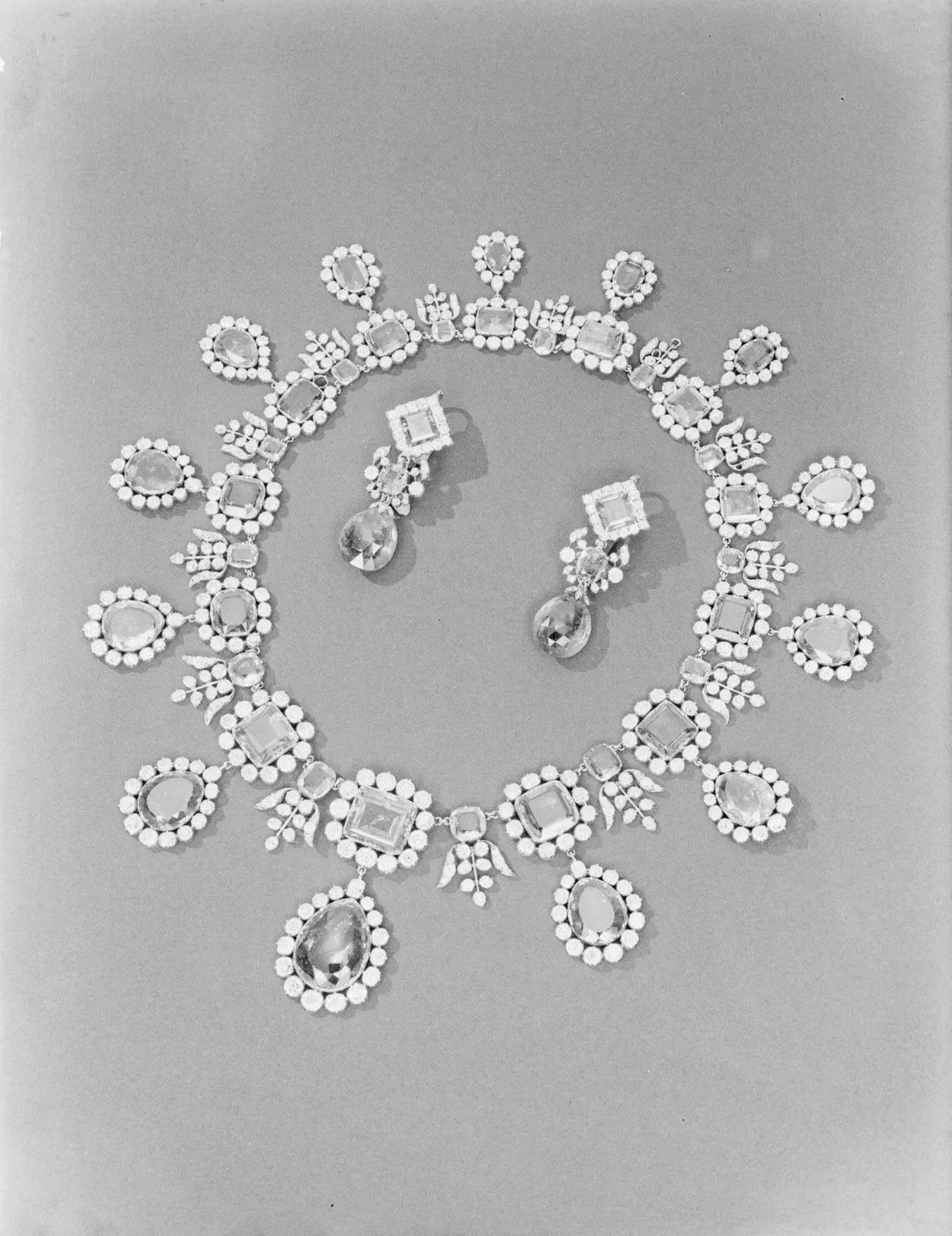 Archival plate of a Van Cleef diamond necklace and matching pendant earrings